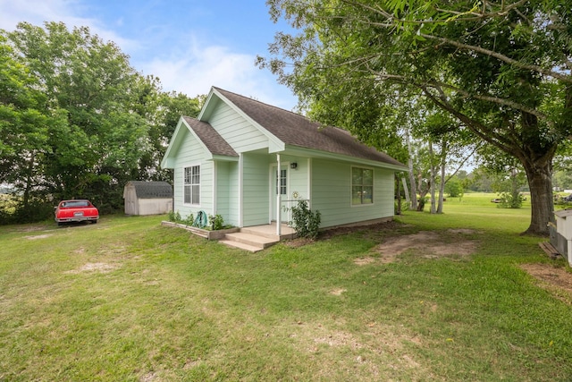 2350 Hawk Mdws, Pearland, TX 77581 - view of front of property featuring a front yard and a shingled roof