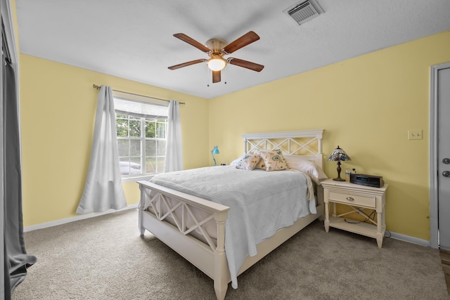 2350 Hawk Mdws, Pearland, TX 77581 - carpeted bedroom featuring baseboards and a ceiling fan