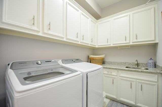 7 Champion Villa Dr, Houston, TX 77069 - laundry area with cabinet space and washer and clothes dryer