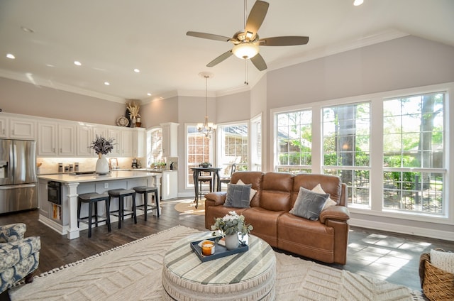 7 Champion Villa Dr, Houston, TX 77069 - living area featuring a chandelier, recessed lighting, a ceiling fan, a high ceiling, and ornamental molding