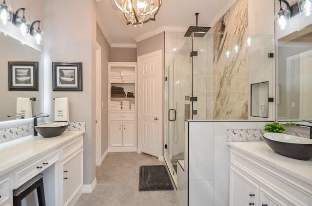 7 Champion Villa Dr, Houston, TX 77069 - full bathroom featuring a stall shower, ornamental molding, two vanities, a chandelier, and tile patterned floors
