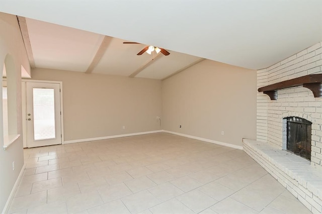 5502 Irish Hill Dr, Houston, TX 77053 - unfurnished living room with ceiling fan, a brick fireplace, baseboards, and light tile patterned floors