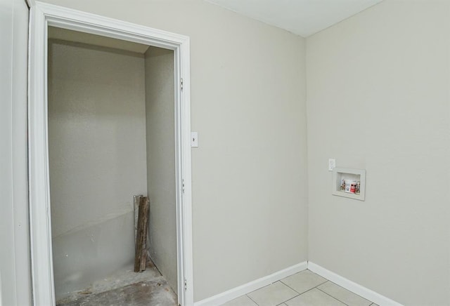 5502 Irish Hill Dr, Houston, TX 77053 - laundry room with hookup for a washing machine, baseboards, and light tile patterned floors