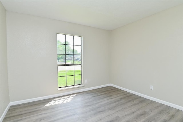 5502 Irish Hill Dr, Houston, TX 77053 - unfurnished room with light wood-type flooring and baseboards