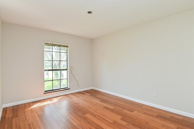 5502 Irish Hill Dr, Houston, TX 77053 - spare room featuring light wood-style flooring and baseboards