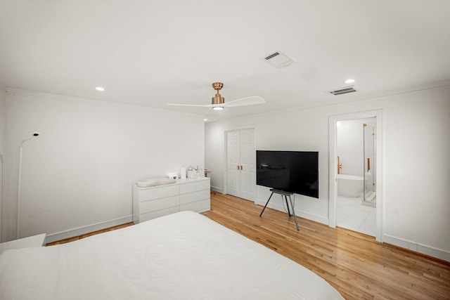 5630 Lymbar Dr, Houston, TX 77096 - bedroom featuring light wood-type flooring, recessed lighting, baseboards, a ceiling fan, and connected bathroom