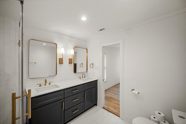 5630 Lymbar Dr, Houston, TX 77096 - full bath featuring double vanity, toilet, recessed lighting, crown molding, and tile patterned flooring