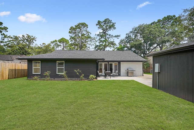 5630 Lymbar Dr, Houston, TX 77096 - rear view of house featuring a patio and brick siding
