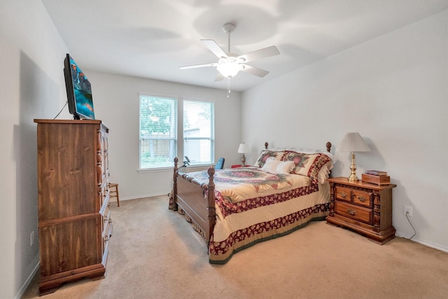 2114 Lost Timbers Dr, Conroe, TX 77304 - bedroom featuring light colored carpet, baseboards, and ceiling fan