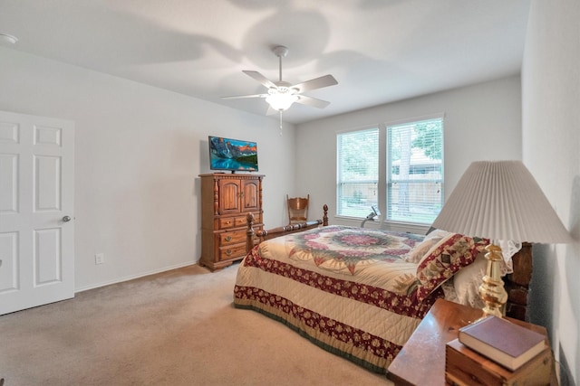 2114 Lost Timbers Dr, Conroe, TX 77304 - bedroom featuring light carpet, a ceiling fan, and baseboards