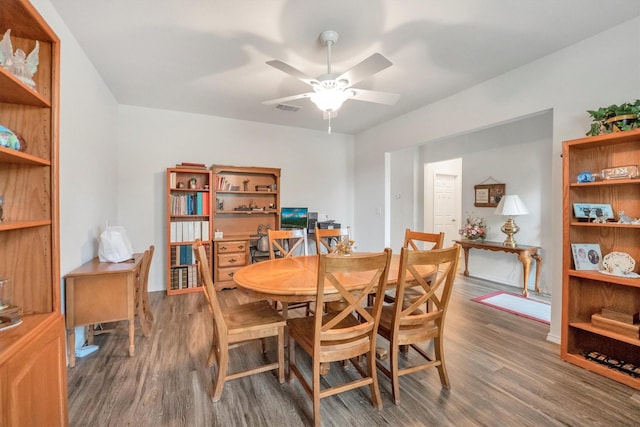 2114 Lost Timbers Dr, Conroe, TX 77304 - dining space featuring wood finished floors and ceiling fan