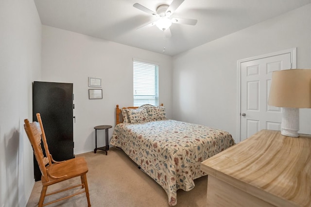 2114 Lost Timbers Dr, Conroe, TX 77304 - bedroom with light colored carpet, baseboards, and ceiling fan