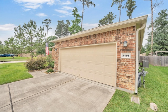 2114 Lost Timbers Dr, Conroe, TX 77304 - garage with concrete driveway and cooling unit