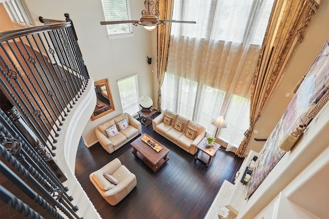 2915 Sentry Oak Way, Sugar Land, TX 77479 - living area with a towering ceiling, hardwood / wood-style flooring, and ceiling fan