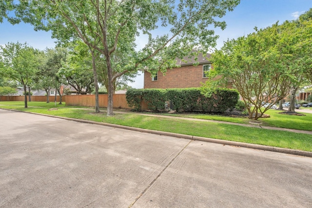 7318 Starbridge Dr, Houston, TX 77095 - view of home's exterior featuring brick siding