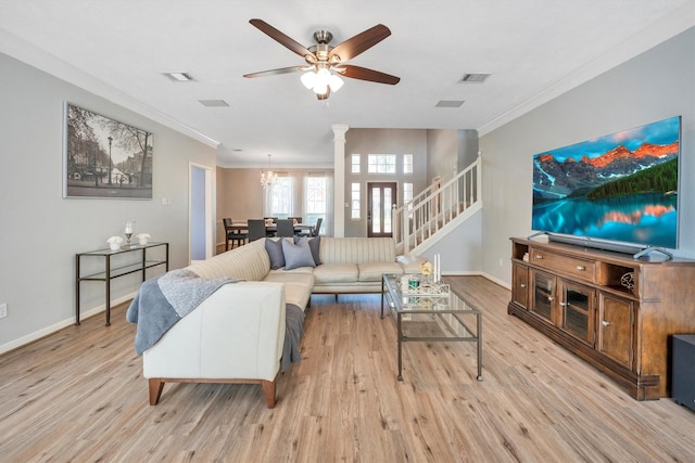 7318 Starbridge Dr, Houston, TX 77095 - living area with ornamental molding, light wood-type flooring, baseboards, decorative columns, and stairway
