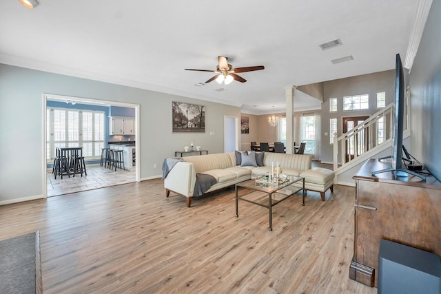7318 Starbridge Dr, Houston, TX 77095 - living area with ornamental molding, light wood-style floors, baseboards, and ceiling fan