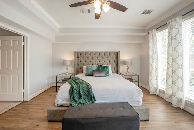 7318 Starbridge Dr, Houston, TX 77095 - bedroom with wood finished floors, crown molding, baseboards, and ceiling fan