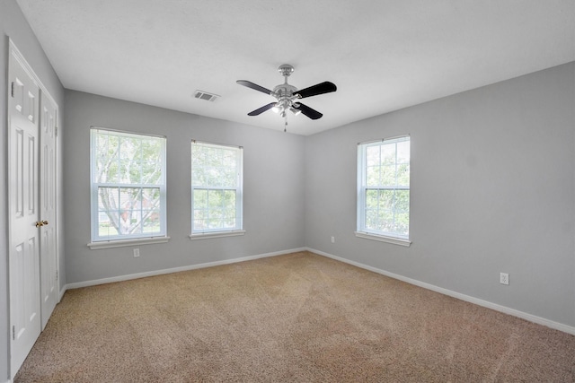 7318 Starbridge Dr, Houston, TX 77095 - unfurnished bedroom featuring carpet floors, baseboards, a ceiling fan, and a closet