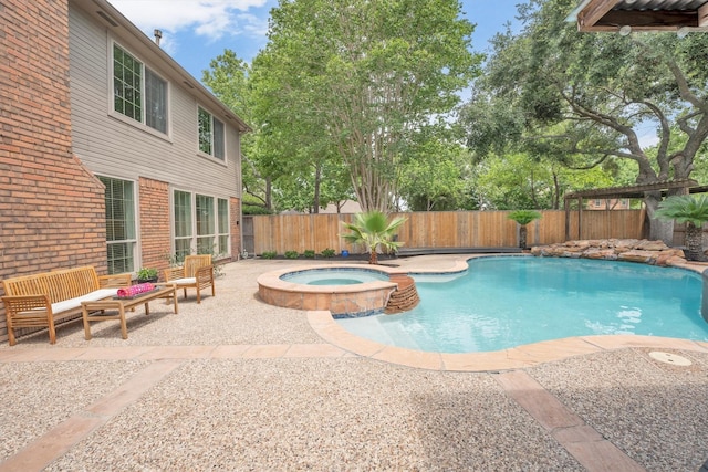 7318 Starbridge Dr, Houston, TX 77095 - view of swimming pool featuring a fenced backyard, a patio area, a pool with connected hot tub, and an outdoor living space