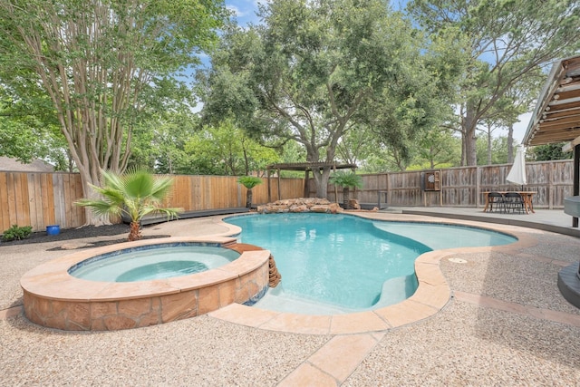 7318 Starbridge Dr, Houston, TX 77095 - view of swimming pool featuring a fenced backyard and a pool with connected hot tub