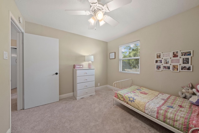 489 Merrimac Park, Conroe, TX 77302 - carpeted bedroom featuring ceiling fan and baseboards