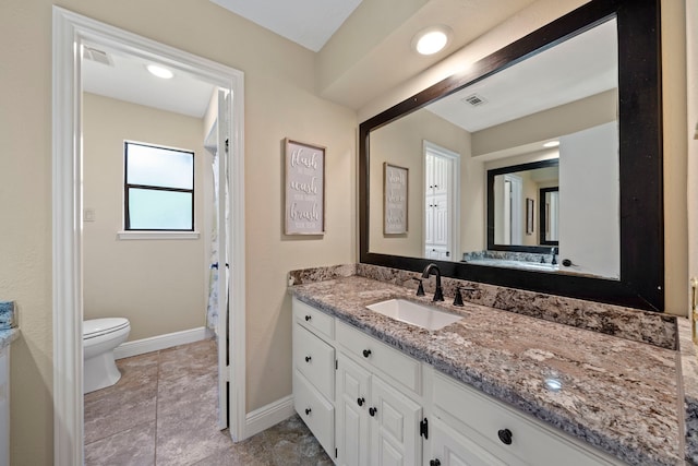 489 Merrimac Park, Conroe, TX 77302 - bathroom with vanity, toilet, and baseboards