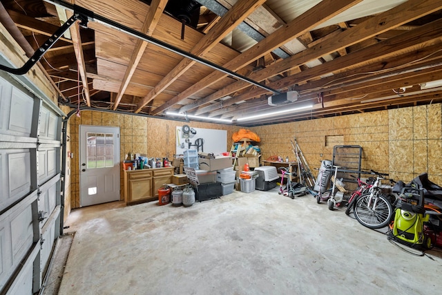 489 Merrimac Park, Conroe, TX 77302 - garage featuring a garage door opener