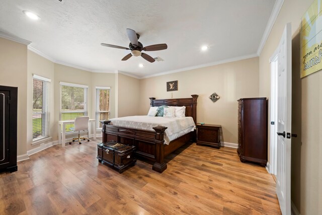 489 Merrimac Park, Conroe, TX 77302 - bedroom featuring light wood-type flooring, baseboards, crown molding, recessed lighting, and ceiling fan