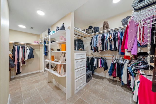 489 Merrimac Park, Conroe, TX 77302 - walk in closet with light tile patterned floors