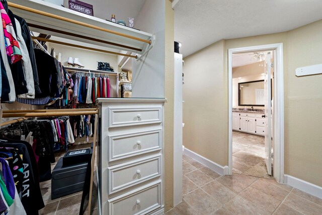 489 Merrimac Park, Conroe, TX 77302 - spacious closet with a sink and light tile patterned flooring