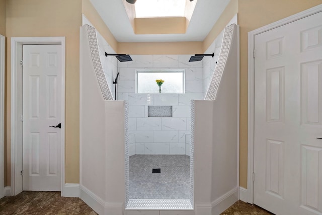 489 Merrimac Park, Conroe, TX 77302 - full bathroom featuring baseboards and a walk in shower