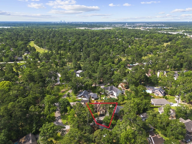 489 Merrimac Park, Conroe, TX 77302 - aerial view of residential area featuring property parcel outlined and a heavily wooded area