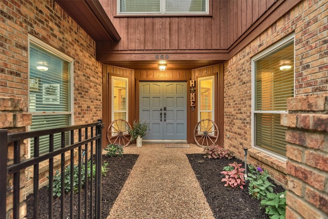 660 Hillcrest Dr, Huntsville, TX 77340 - doorway to property featuring brick siding