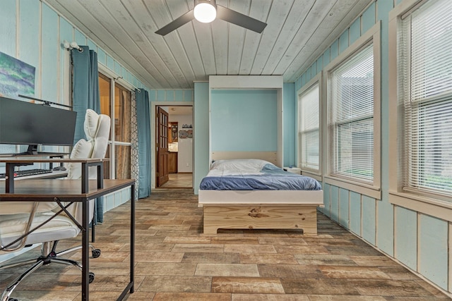 660 Hillcrest Dr, Huntsville, TX 77340 - bedroom featuring wood finished floors, an office area, and wooden ceiling
