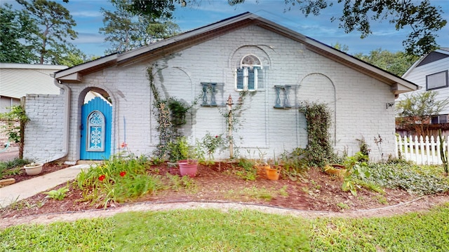 9723 Dalmally St, Spring, TX 77379 - view of property exterior featuring brick siding