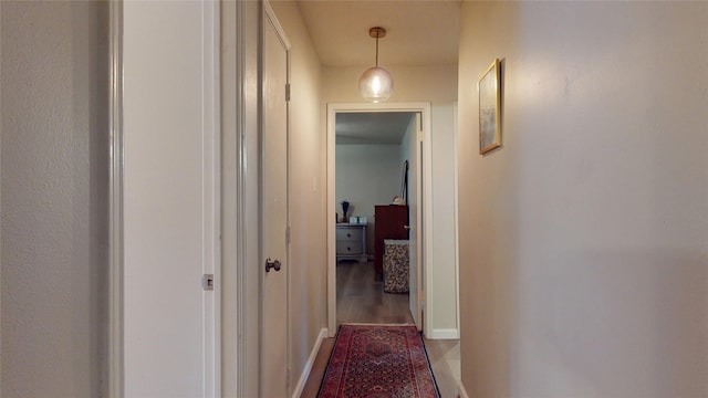 9723 Dalmally St, Spring, TX 77379 - hall featuring baseboards and wood finished floors