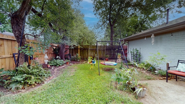 9723 Dalmally St, Spring, TX 77379 - view of yard featuring a patio area