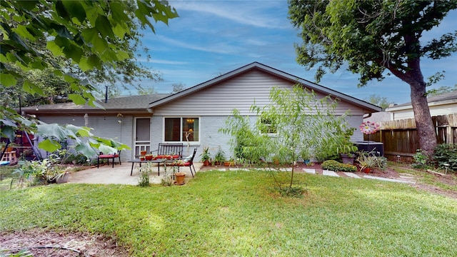 9723 Dalmally St, Spring, TX 77379 - back of house with a patio and brick siding