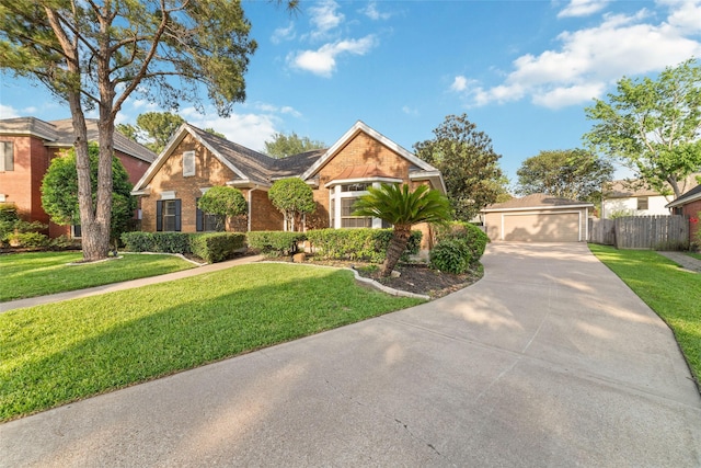 16919 Shady Square Ct, Houston, TX 77095 - view of front of property with brick siding, a garage, and concrete driveway