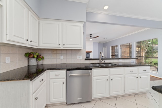 16919 Shady Square Ct, Houston, TX 77095 - kitchen featuring dishwasher, a sink, ornamental molding, white cabinets, and light tile patterned flooring