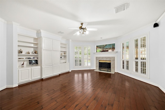 1930 Hollys Way, Sugar Land, TX 77479 - unfurnished living room featuring ceiling fan, baseboards, a fireplace, crown molding, and dark wood-type flooring