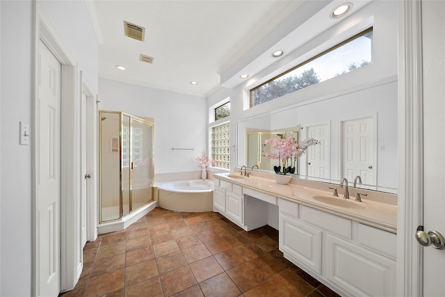 1930 Hollys Way, Sugar Land, TX 77479 - bathroom with a bath, double vanity, a shower stall, ornamental molding, and recessed lighting