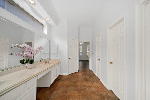 1930 Hollys Way, Sugar Land, TX 77479 - bathroom featuring baseboards, stone finish floors, double vanity, crown molding, and recessed lighting