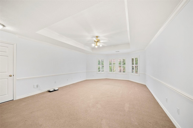 1930 Hollys Way, Sugar Land, TX 77479 - carpeted empty room with a tray ceiling, a ceiling fan, ornamental molding, and baseboards