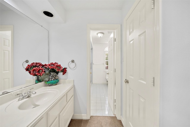 1930 Hollys Way, Sugar Land, TX 77479 - bathroom with vanity, baseboards, and tile patterned flooring