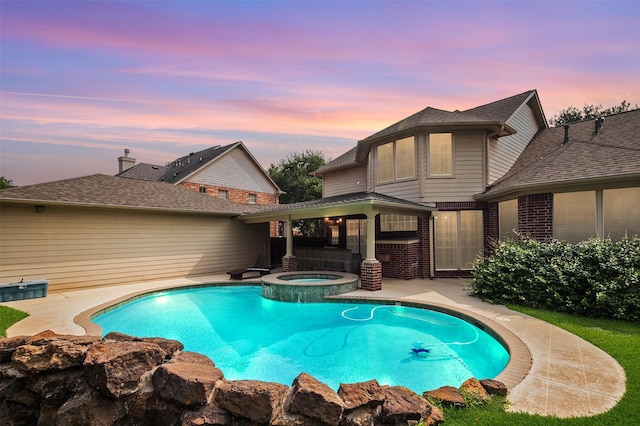 1930 Hollys Way, Sugar Land, TX 77479 - view of pool with a patio and a pool with connected hot tub