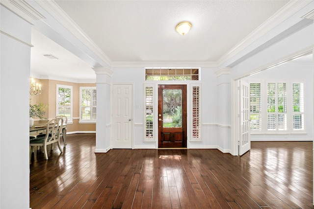 1930 Hollys Way, Sugar Land, TX 77479 - foyer entrance featuring baseboards, a chandelier, dark wood finished floors, and ornamental molding
