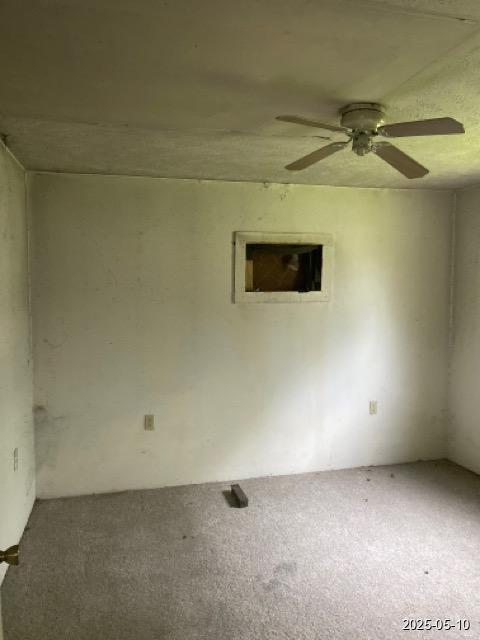 201 W Oak, Daisetta, TX 77533 - carpeted spare room featuring ceiling fan