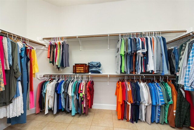17311 Morgans Lake Dr, Cypress, TX 77433 - walk in closet featuring tile patterned flooring
